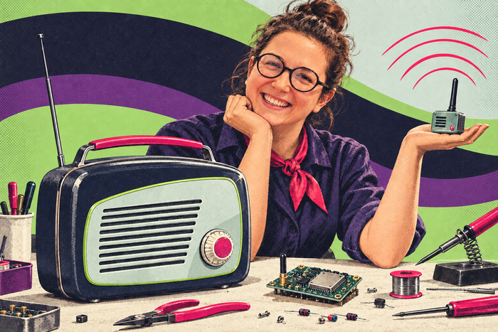 Rasmine with a radio and electronics at her workbench.