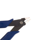 En nærbillede af Skævbider/Bidetang til blød tråd, der vender mod højre, viser metaloverfladen og fine skærekanter 