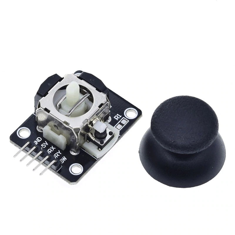 Image of En sort centertryk i højre og en KY-023 Joystick modul  i venstre