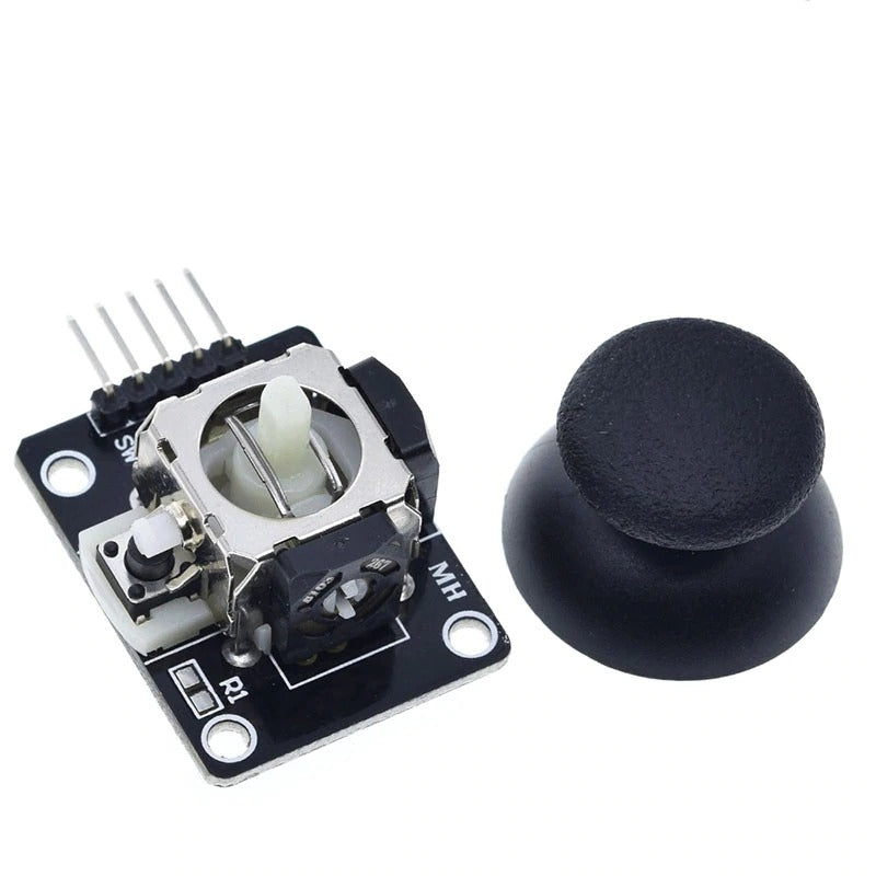 Image of En sort centertryk og en KY-023 Joystick modul  